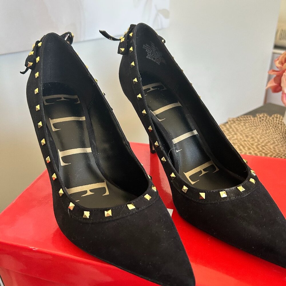 Black dress shoe with gold studs